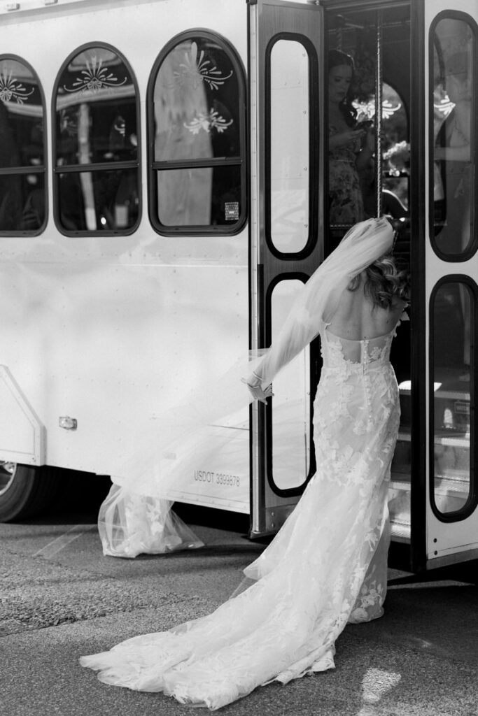 A bride steps into a trolley
