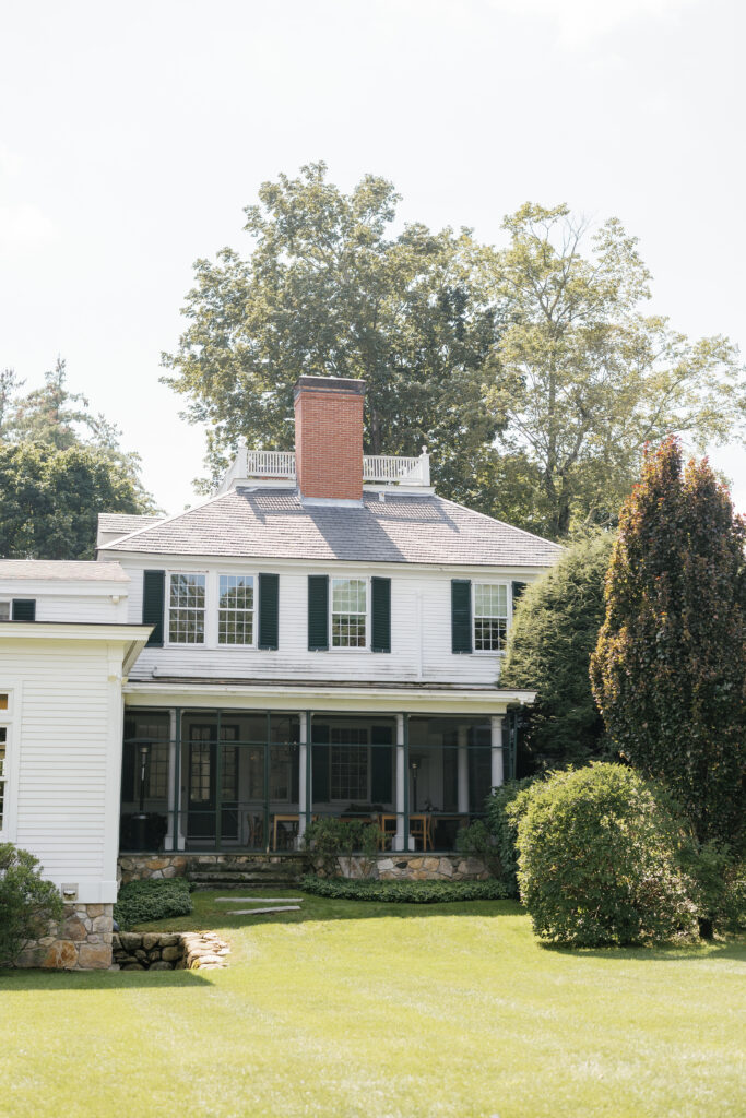 A large white colonial estate. 